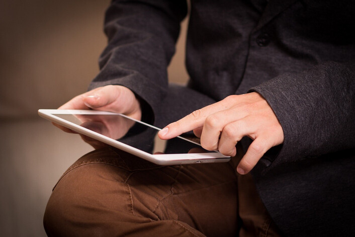 man with tablet